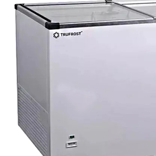 Technician inspecting a deep freezer for repair and maintenance in Gurugram